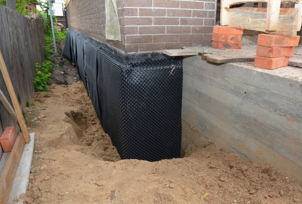 Happy homeowners after waterproofing job in Greencastle